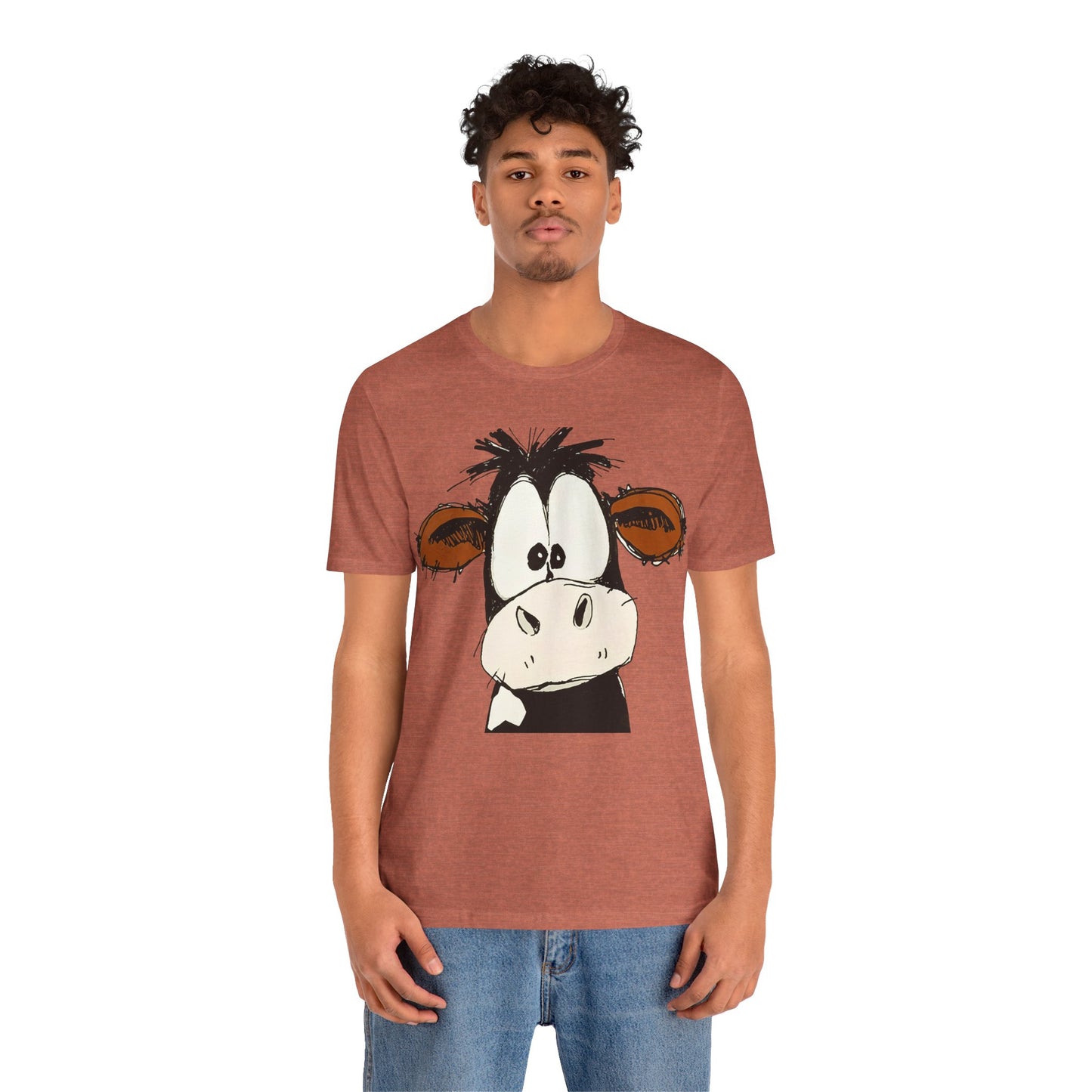 This STARTLED COW CARTOON Tee gives off a fun and quirky vibe, perfect for casual wear or as a statement piece. Ideal for those who love unique and whimsical designs.