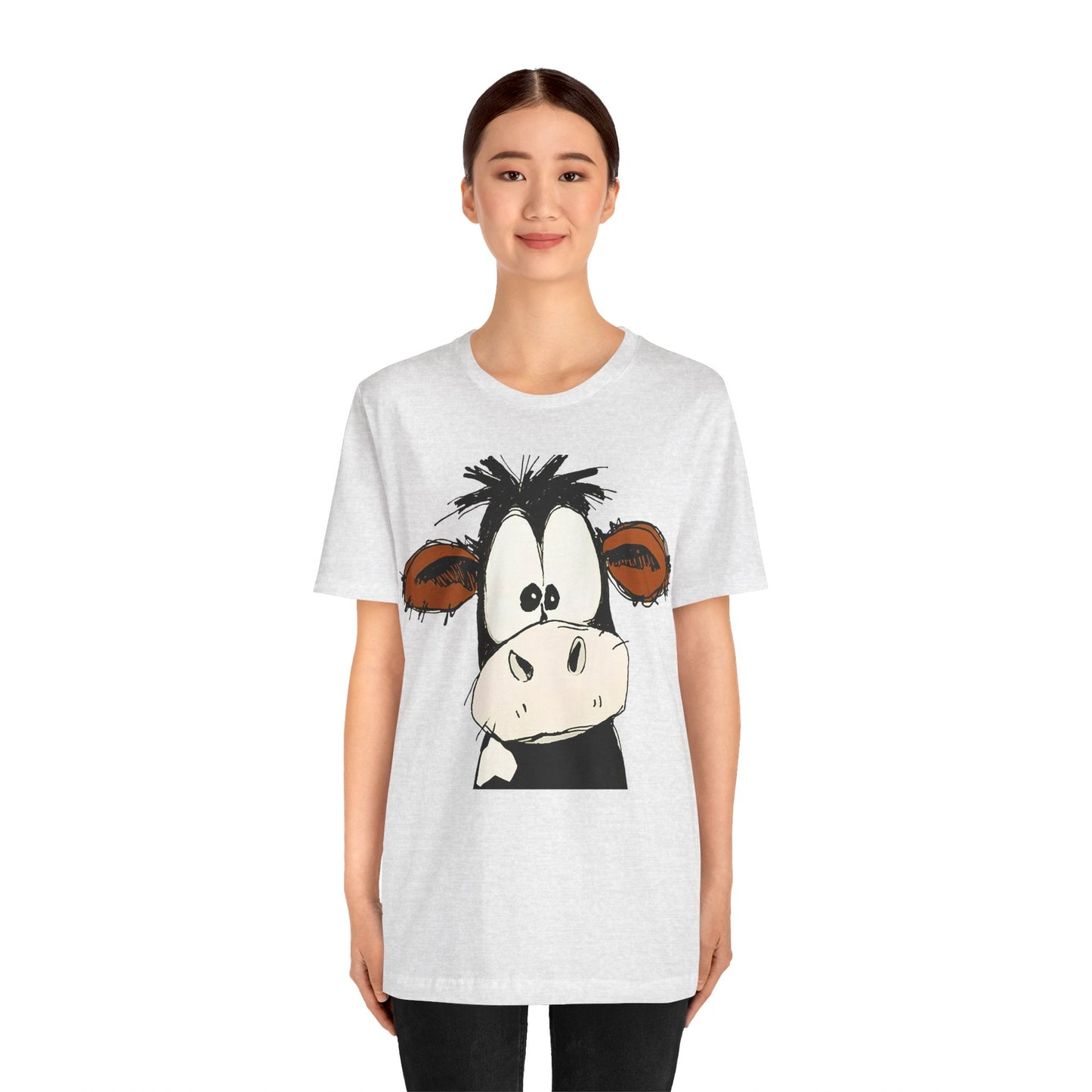 This STARTLED COW CARTOON Tee gives off a fun and quirky vibe, perfect for casual wear or as a statement piece. Ideal for those who love unique and whimsical designs.