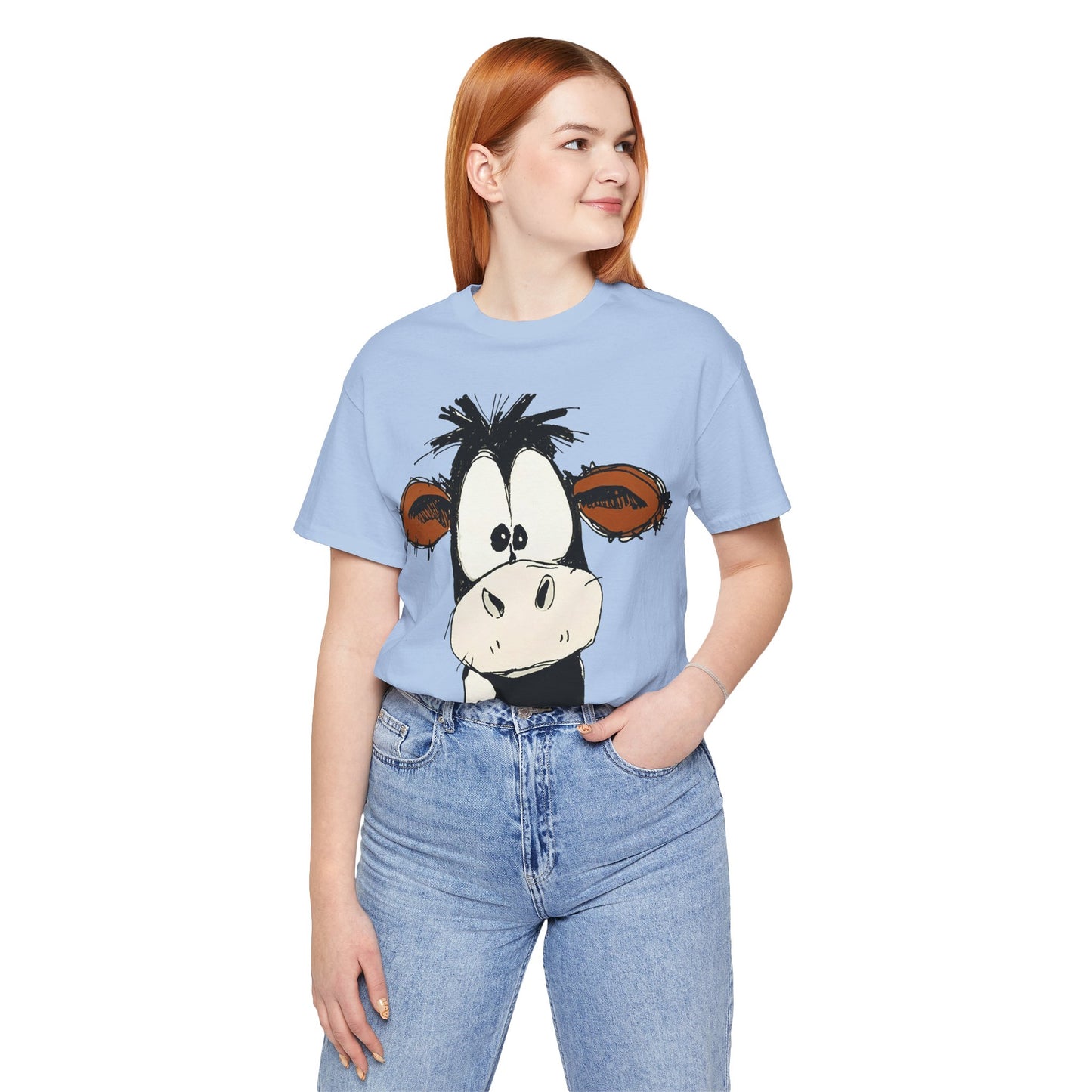This STARTLED COW CARTOON Tee gives off a fun and quirky vibe, perfect for casual wear or as a statement piece. Ideal for those who love unique and whimsical designs.