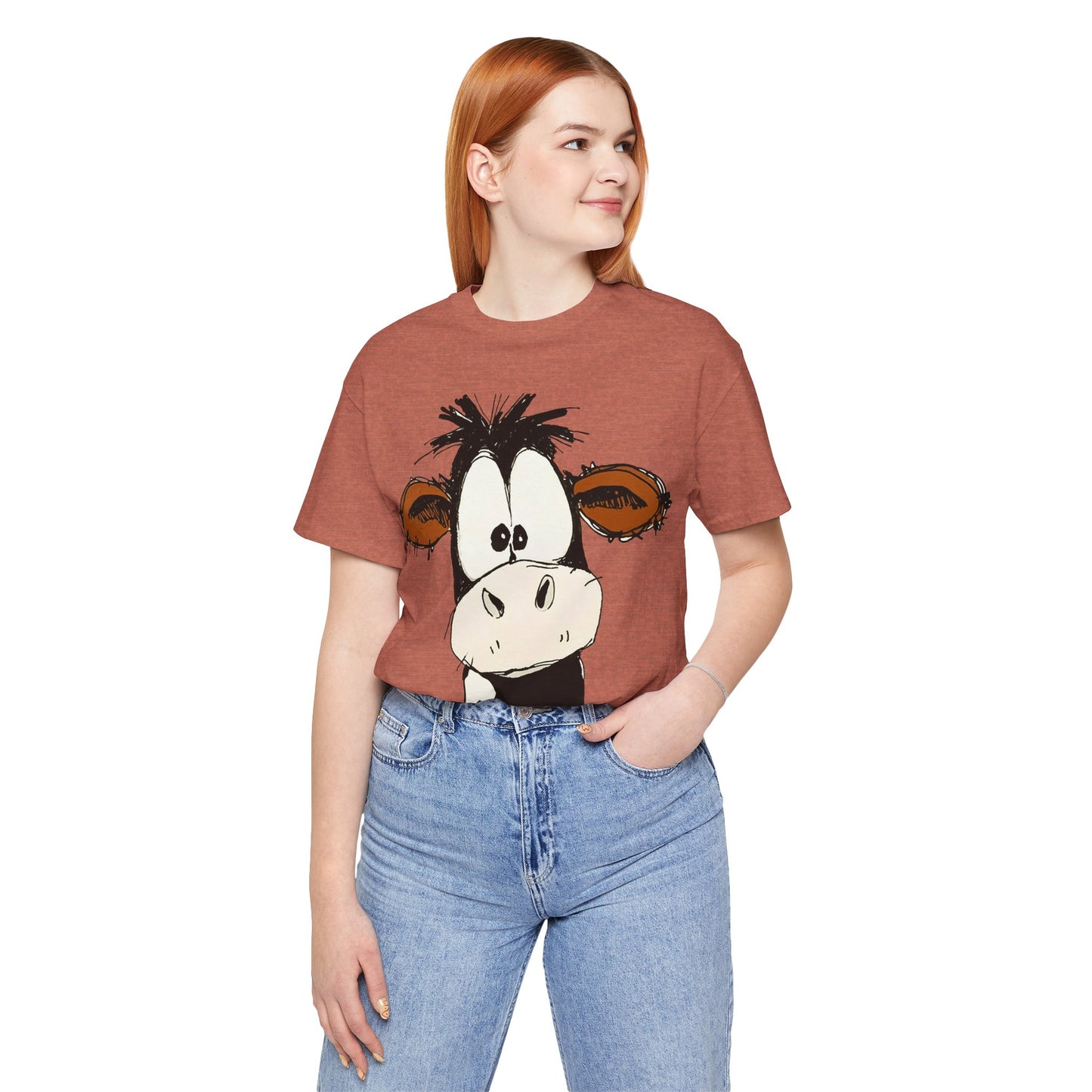 This STARTLED COW CARTOON Tee gives off a fun and quirky vibe, perfect for casual wear or as a statement piece. Ideal for those who love unique and whimsical designs.